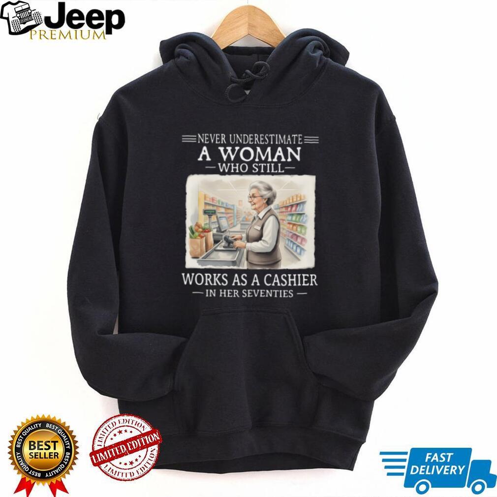 Never Underestimate A Woman Who Works As A Cashier In Her 70s T Shirt