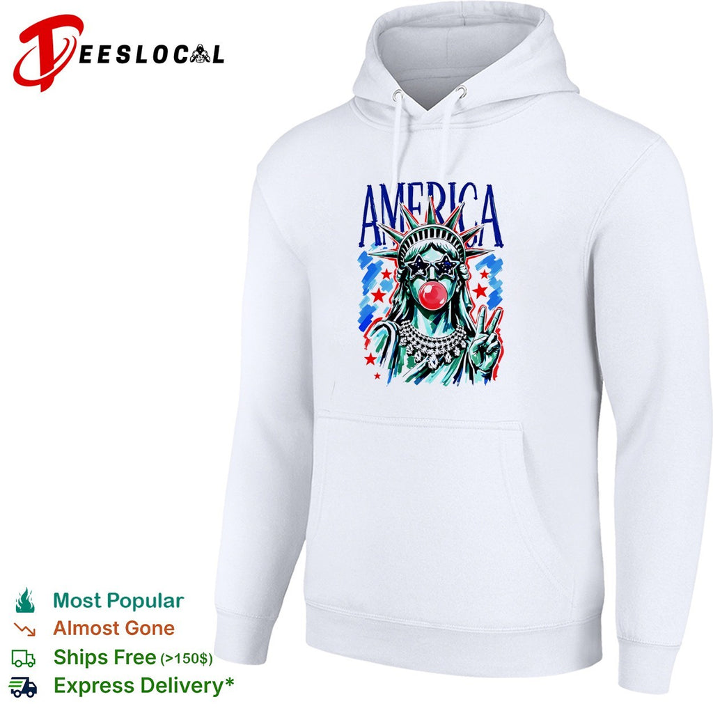 The Statue of Liberty is chewing gum and wearing sunglasses with an American flag design shirt