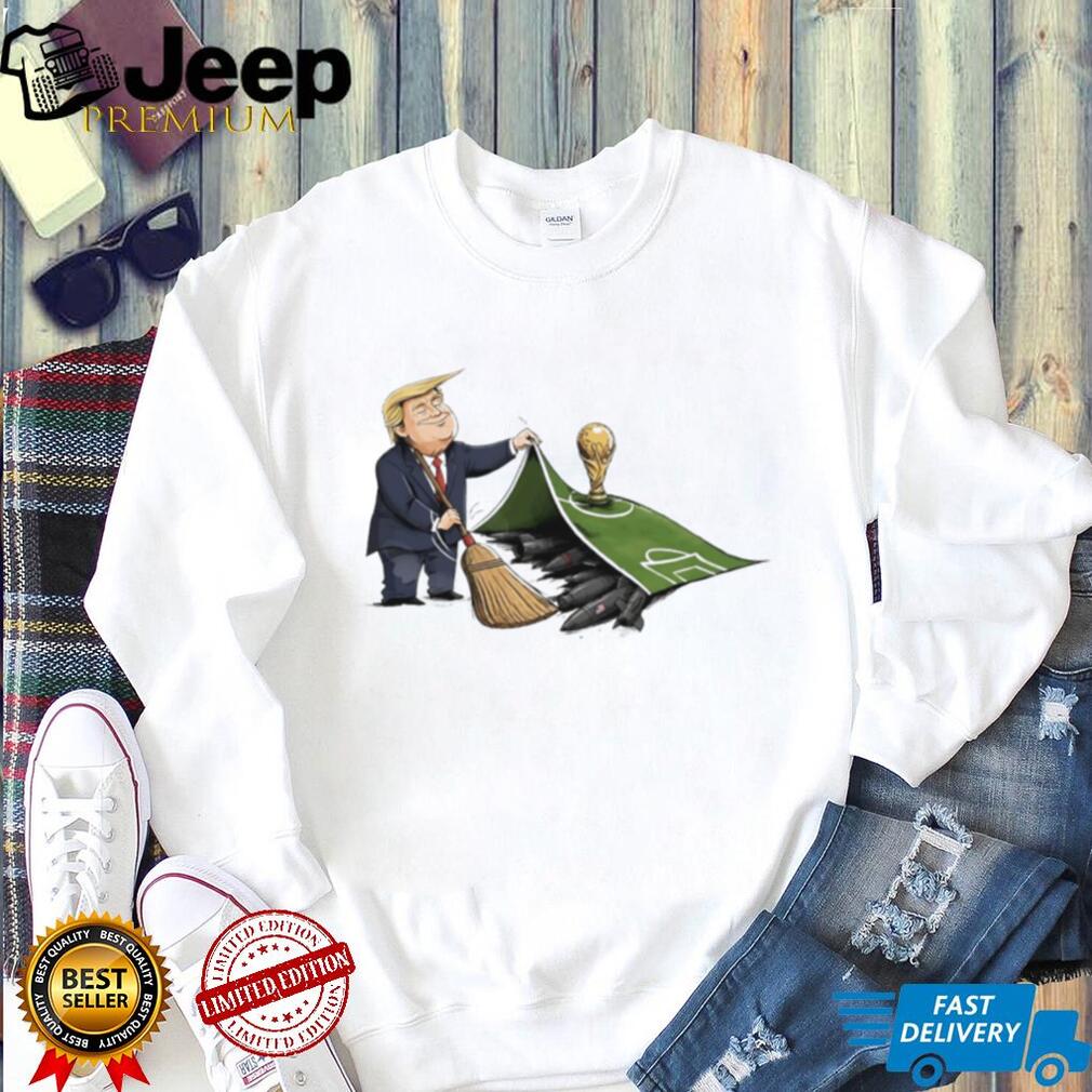 Trump versus Hormuz beside World Cup illustration shirt