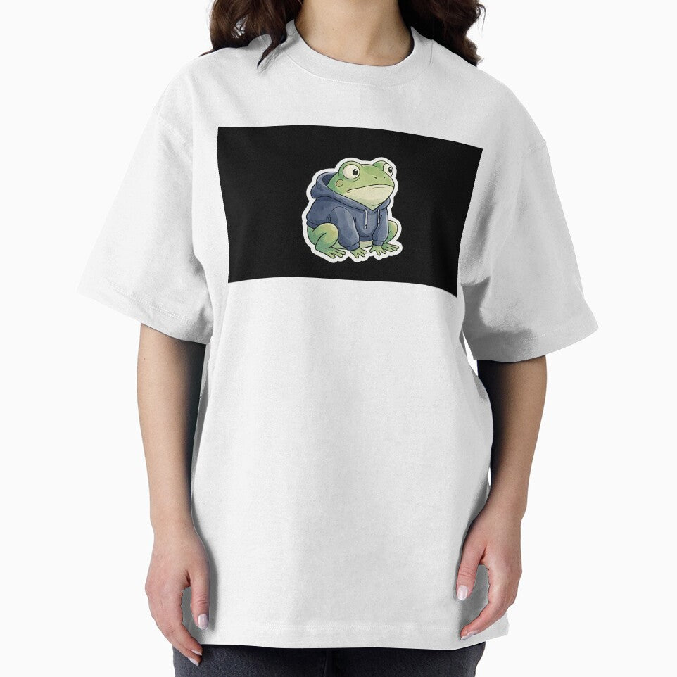 A cute, round frog looking confused, wearing a tiny hoodie. White border for sticker. by Yogeshrock