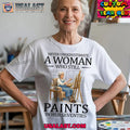 Never underestimate a woman who still paints in her seventies shirt